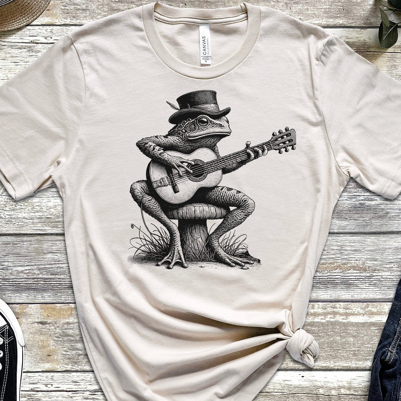 Cottagecore Guitar Frog T-Shirt – Cute Frog Playing Guitar Graphic Tee