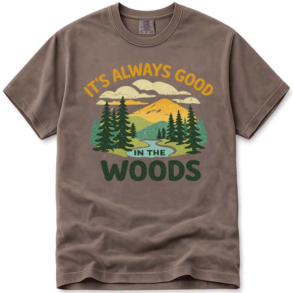 Brown t-shirt with nature graphic and 'It's Always Good in the Woods' text on a white background