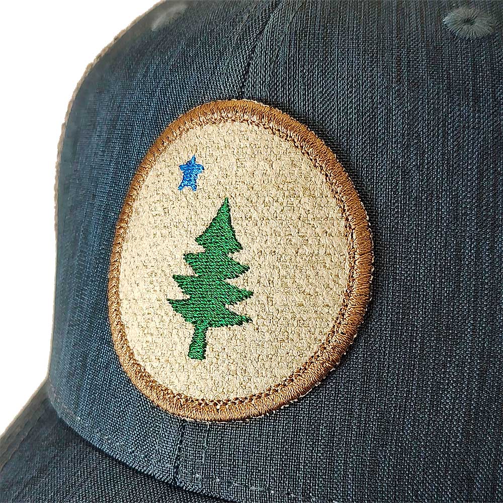 Close-Up of a Vintage Maine Flag Hat | Embroidered Pine Tree Trucker Cap | Maine Patch Hat - Navy